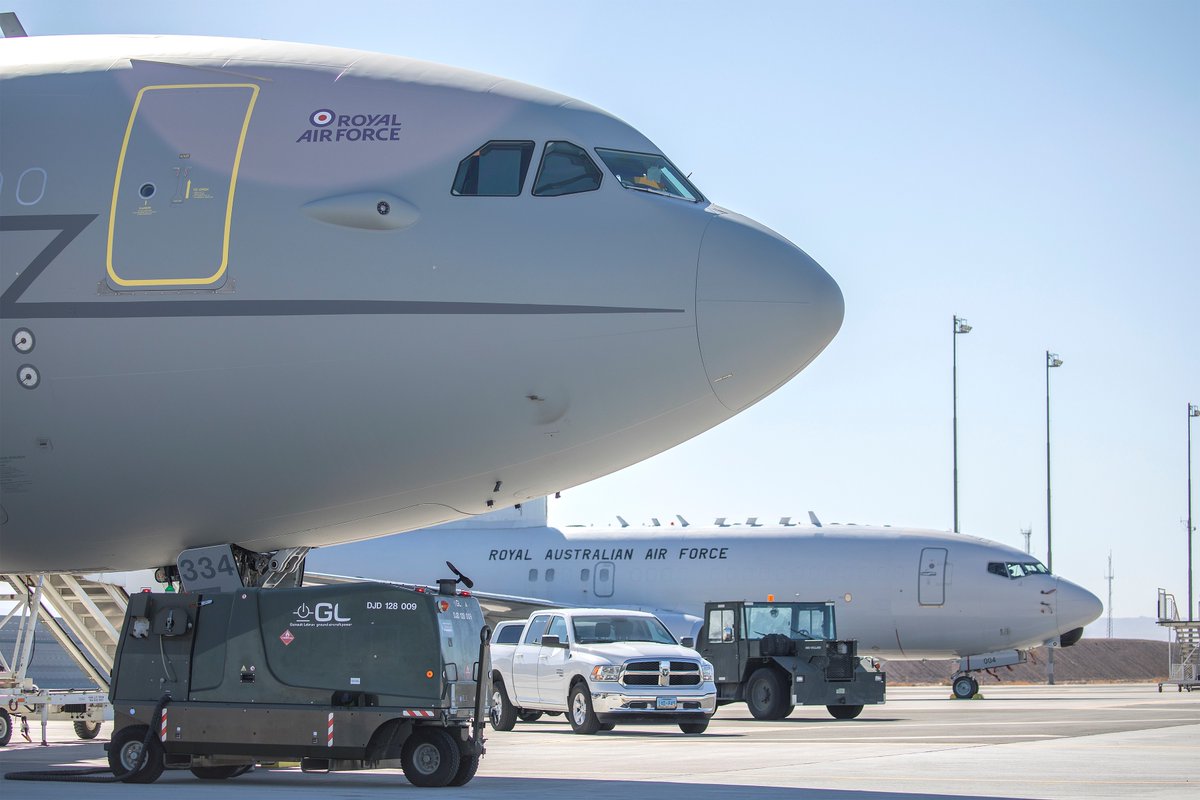 Image shows a Voyager and Royal Australian Air Force aircraft.