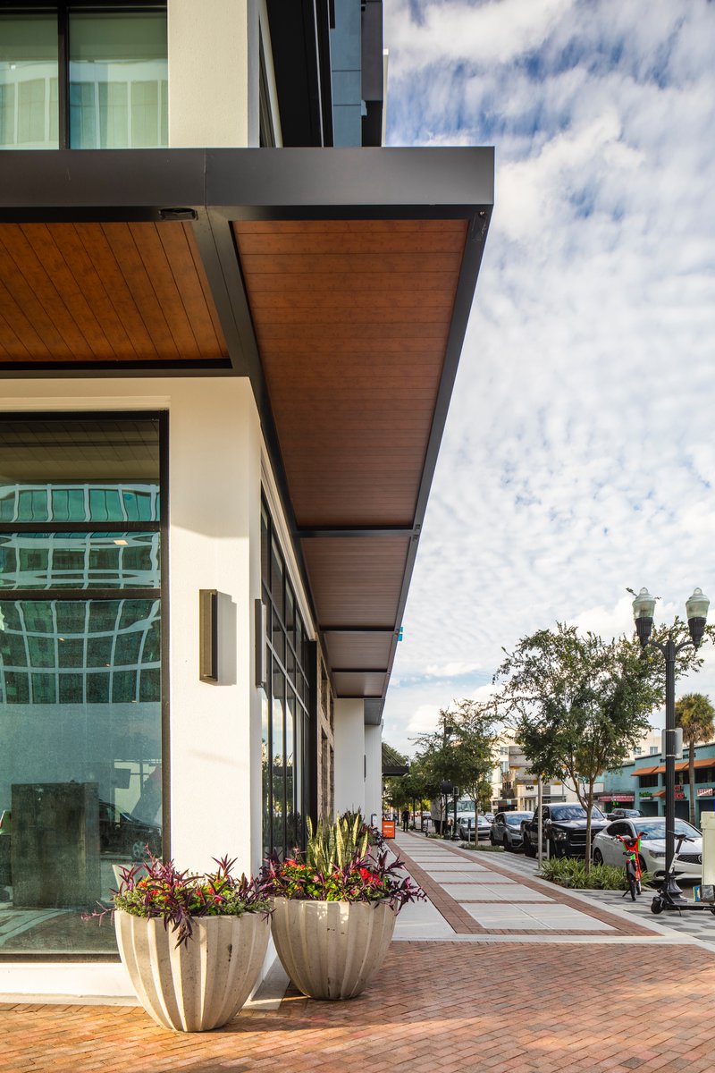 SundanceArch's tweet photo. Don't underestimate the power of a canopy and how it can completely elevate your building's facade. Take your building to the next level with one of our custom flat metal canopies!

#flatmetalcanopy #aluminummaterials #woodgrain #soffits #exteriordetails #architecturalproducts https://t.co/DJ8cNJqjMv
