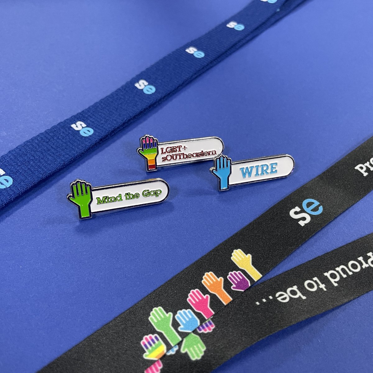 KadfireLtd's tweet photo. Check out these 'handy' enamel pins and lanyards, recently designed for @Se_Railway’s Colleague Network Groups,.

The 3 groups showcased: WIRE (Women in Rail Empowerment), LGBT+ and Mind The Gap (better Mental Health advocates). https://t.co/h3VDDG8z40