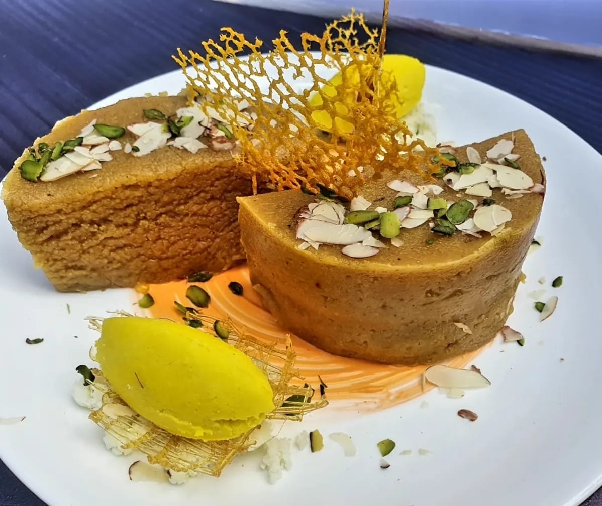 MasterChefIrfan's tweet photo. Mohanthal is an Indian sweet made with besan (gram flour), ghee, sugar and flavored with cardamom and saffron. It has a grainy texture. Basically Mohanthal is a traditional Gujarati sweet dish but It is also made in Rajasthan. #masterchefirfankhan #sweet #food #WAMC @ranveerbrar https://t.co/8KTLtFWC6m