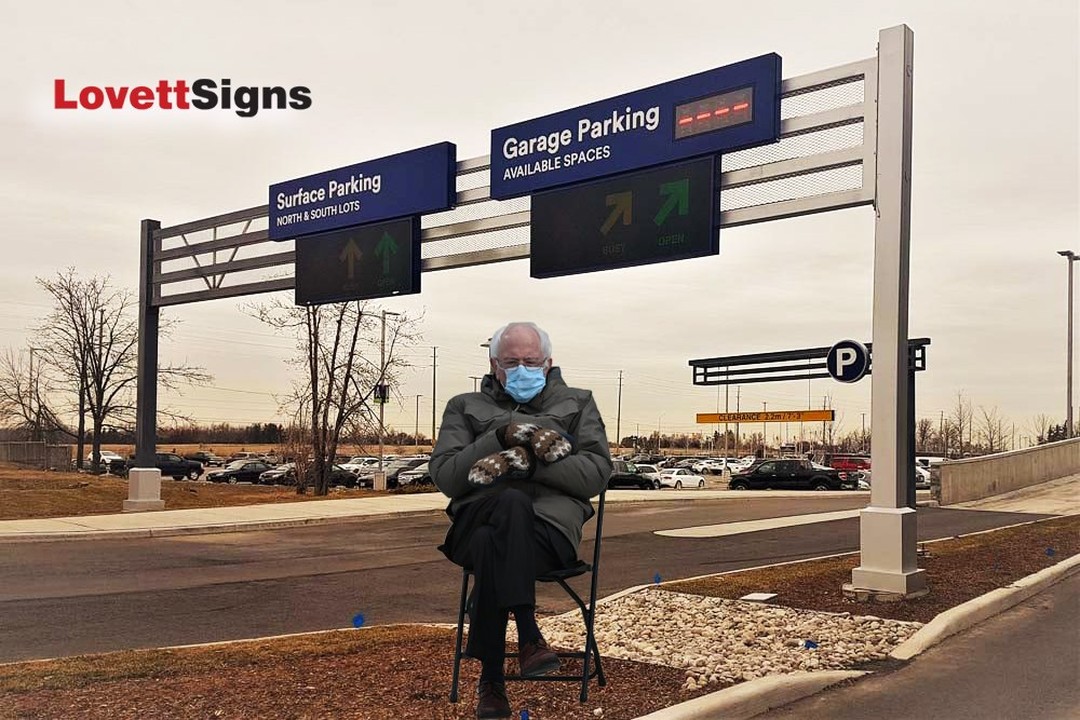 LovettSigns's tweet photo. Throwback Thursday! Remember the Bernie Sanders photo bomb trend? We posted this last year.

Bernie Sanders was spotted by one of our wayfinding signs.
https://t.co/O1qBz77HAz
#wayfindingsigns #architecturalsigns #lovettsigns #signage #signs https://t.co/8EsemMbejc