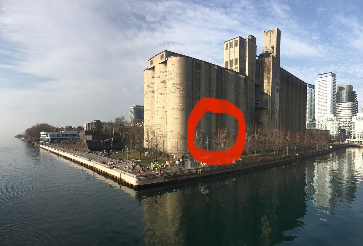 bryanmbowen's tweet photo. Fun discovery - a small crack in the eastern facade of the Canada Malting Co silos has created a perfect pinhole camera. The result: real time projection of Toronto’s waterfront on the silo’s interior curved surfaces. An unplugged projection show! https://t.co/DxrkPiKdcd