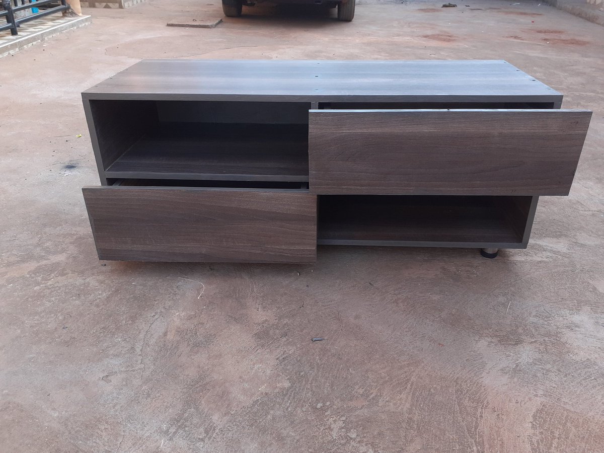 thearcapparel's tweet photo. Our new TV stand by #everything_arc is looking for a new home at only 350,000/=. Made out of American Walnut boards. #arc_furni Retweet, a client could be your TL 🙏 https://t.co/tbqnhBVd5c