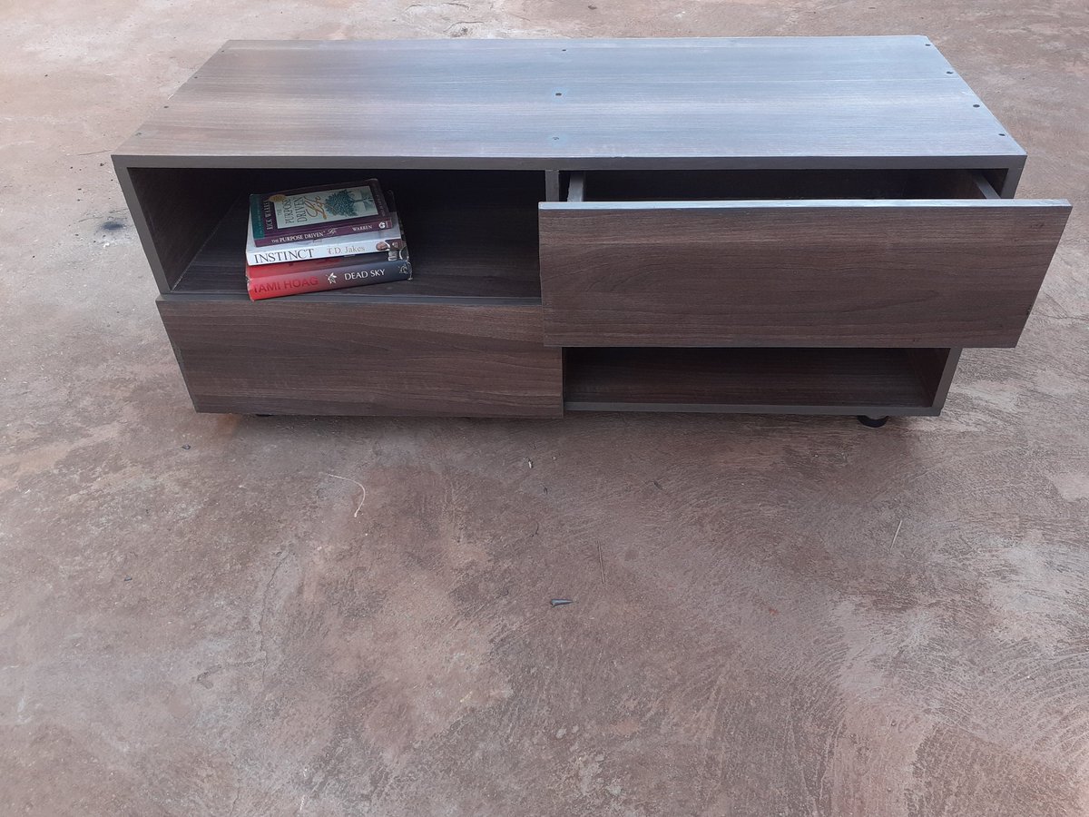 thearcapparel's tweet photo. Our new TV stand by #everything_arc is looking for a new home at only 350,000/=. Made out of American Walnut boards. #arc_furni Retweet, a client could be your TL 🙏 https://t.co/tbqnhBVd5c