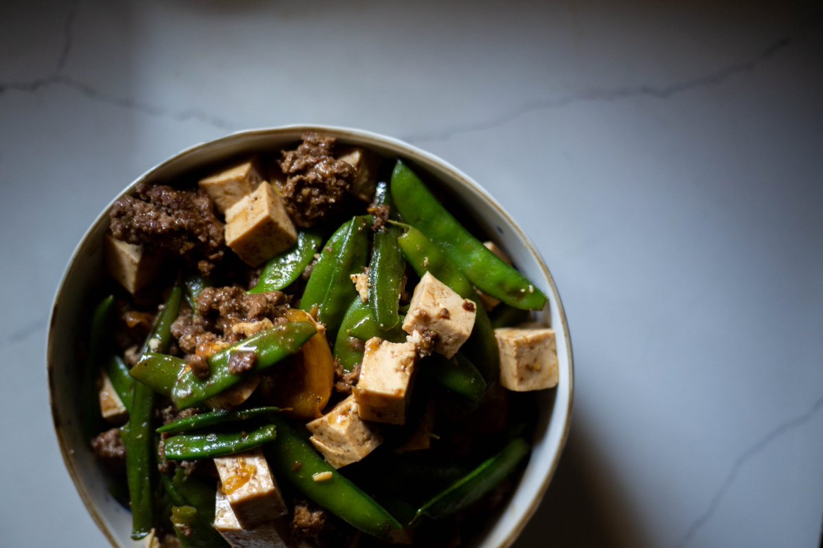What we made from our first trip to <a href="/BerkeleyBowl/">Berkeley Bowl</a>: cumin lamb stirfry with the crispiest sugar snap peas, chopped unripe tomato, jalapeño and firm tofu. We loved our visit - we’re getting soooo many mushrooms next time.