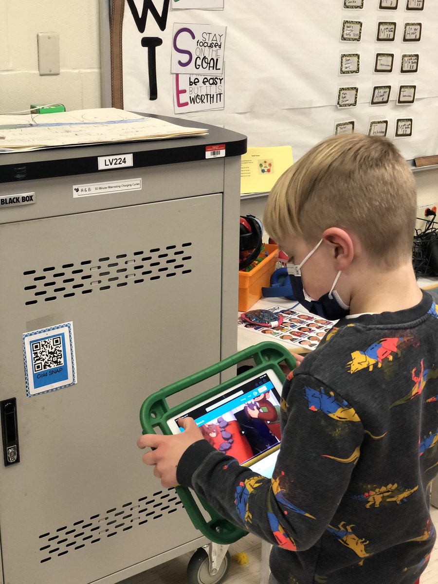 Listening to books on iPads at one of their Guided Reading centers: They love walking around the room to scan the QR code of the book they chose. #ltps #lesltps