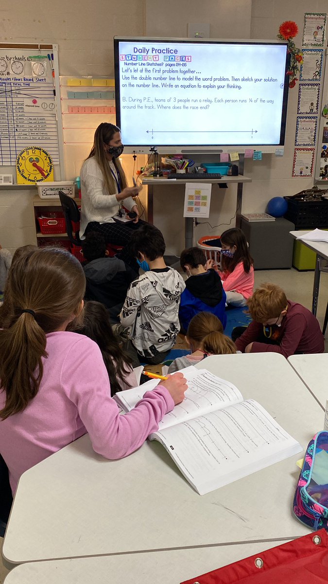 Students in Mrs. Thomas’ 3rd grade class use a number line to solve fraction story problems. #bridges #teamoldham #mathmodels