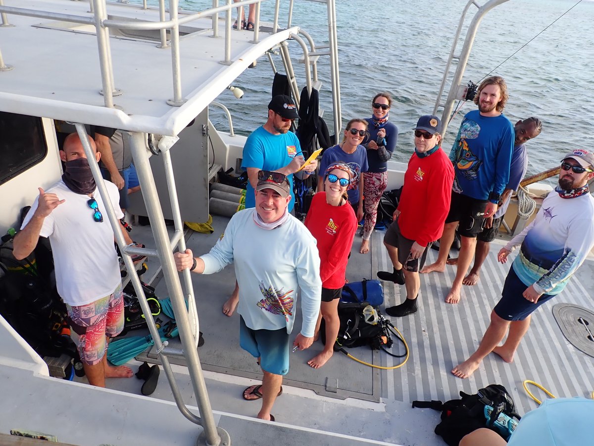 REEF_org's tweet photo. Our Grouper Moon Project team is in the Caymans and on the job studying the spawning aggregations of Nassau Grouper. Team shot of everyone - on land and on deck.
#GrouperMoonProject #groupermoon https://t.co/iP672ejjzX
