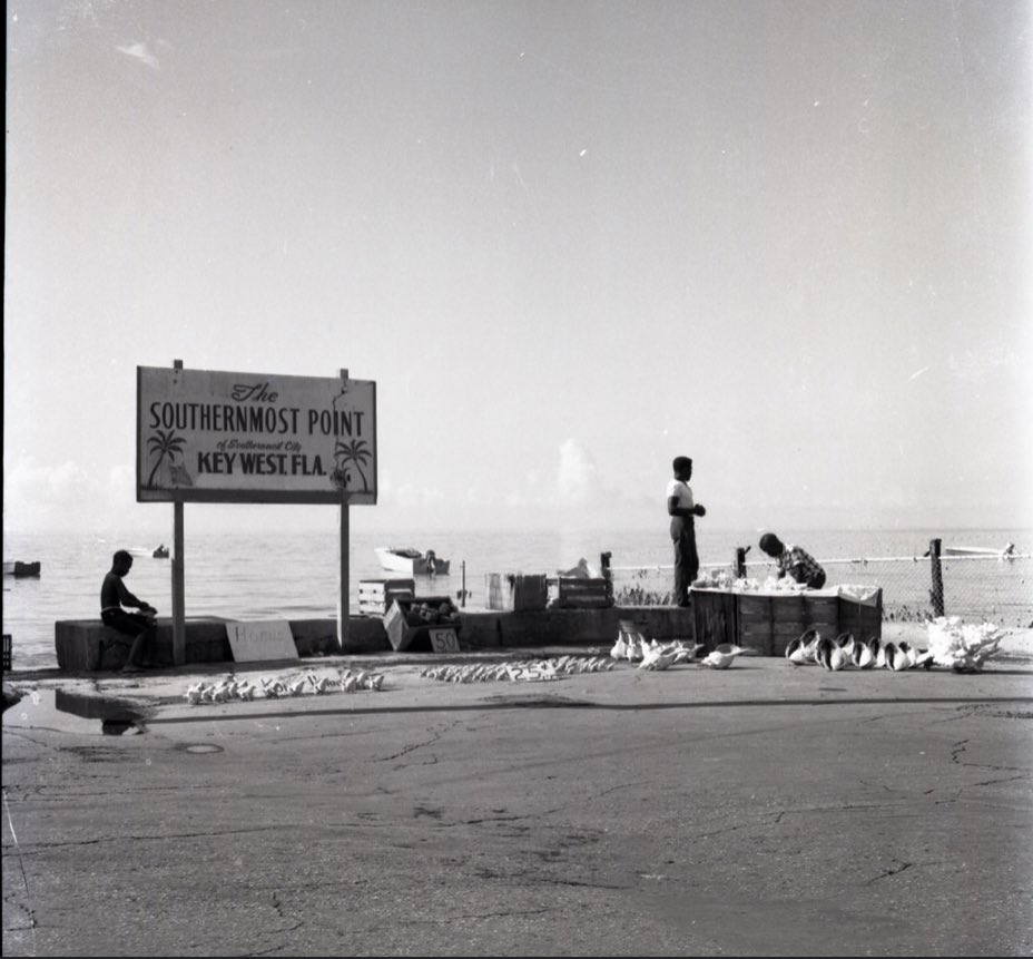 The Southernmost Point with the Kee Family selling shells in the 1960s. 

📸: Don Pinder
#ThrowbackThursday