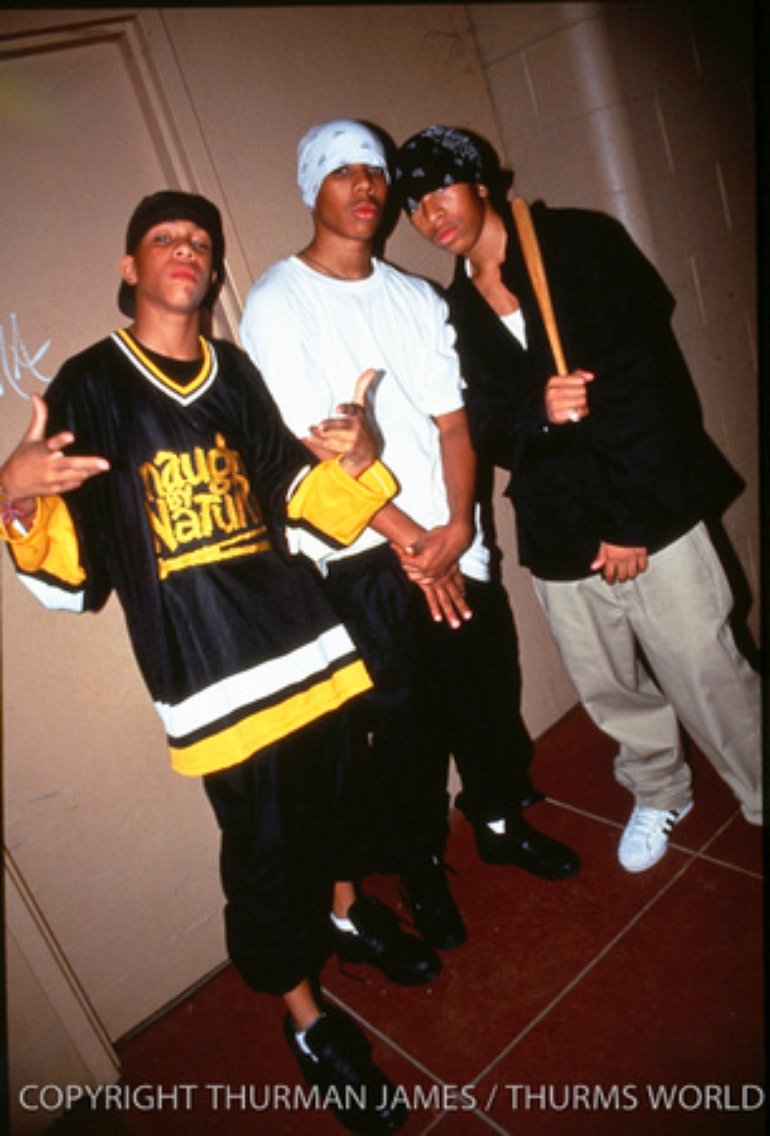 HockeyRapper's tweet photo. .@QuranGoodman (i think)  
of Da Youngstas wearing a @naughtybynature jersey. https://t.co/17JYYAu4zz