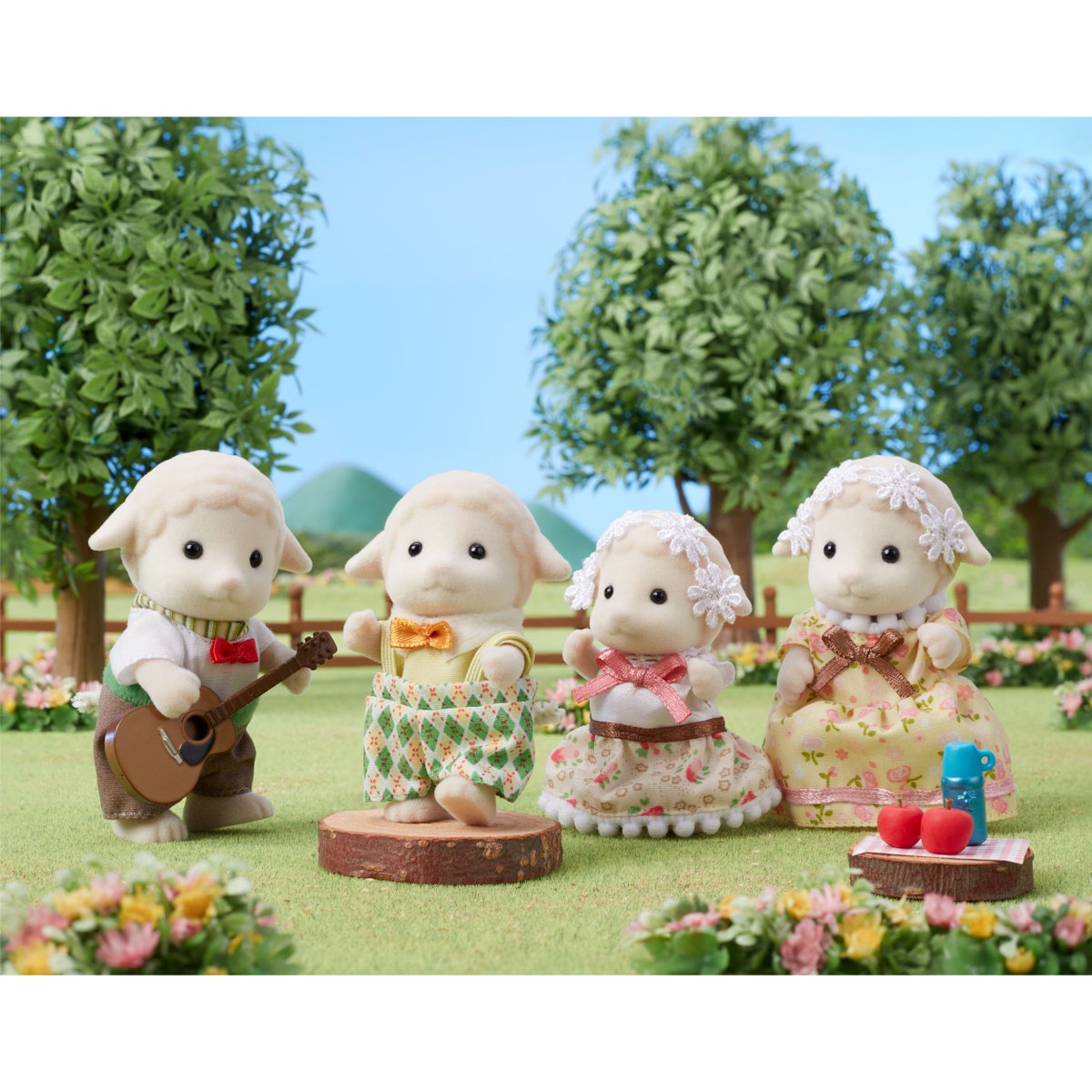 The Sheep Family has arrived in the Sylvanian Village today. 👋 We just know they’re going to settle in perfectly. 🥰 Don't they look happy enjoying their countryside sing-a-long. 🧺 🎶

The brand new Sheep Family Set is available here: sylvanianfamilies.co.uk/shop.html