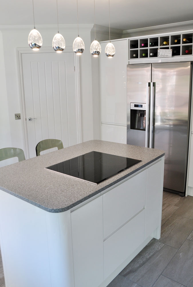 A great example of how a small island can be incorporated into a kitchen. And, by adding rounded corners, the sometimes-harsh look of this style is really softened. Visit our showroom in Coalville, Leicestershire. owen-williams.co.uk Tel: 01530 833960