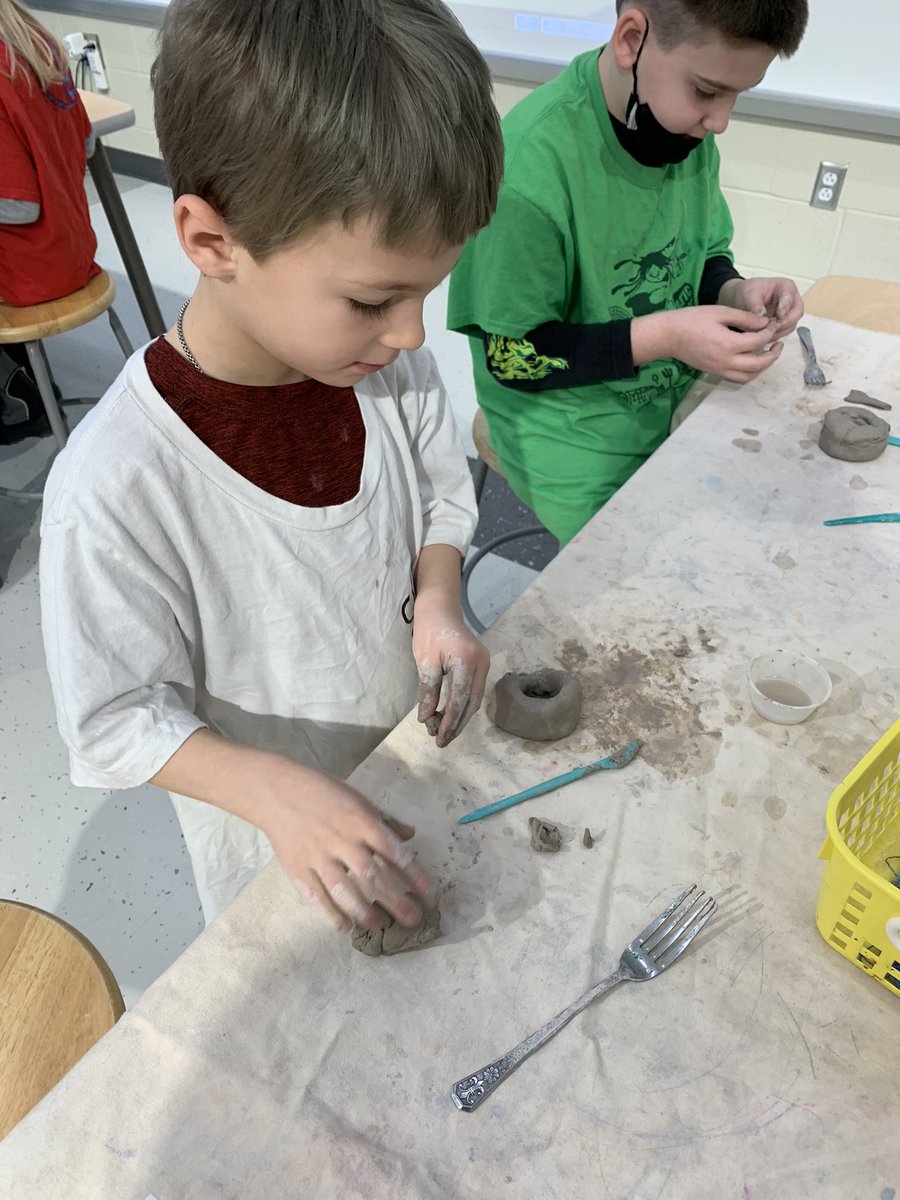 kthomas_artroom's tweet photo. Second grade learned about food sculpture artist, Peter Anton, and then created their own donuts out of clay. They learned how to use some clay techniques in their design: pinch pot, coil, score &amp; slip. Can’t wait to see them painted! @LehighElemNASD https://t.co/X37Wn0sLun