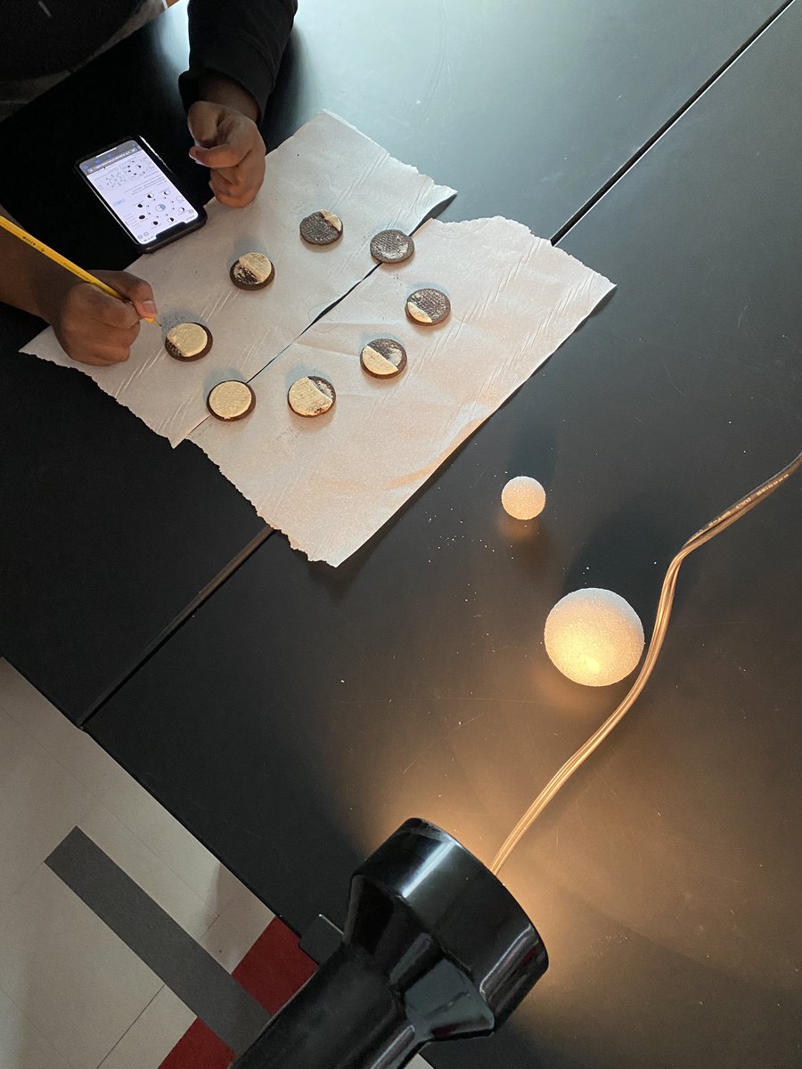 Reeves_Physics's tweet photo. Today’s Astronomy Students we’re mapping the phases of the moon on Oreos after demonstrating them using a light source and styrofoam for the Sun, Earth, and Moon! Fun and delicious activity on this snowy day! #iteachphysics #astronomy #iteachastronomy https://t.co/WhQgahd7Yt