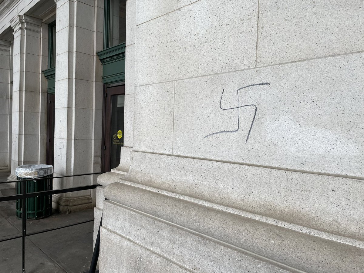 BoKnowsNews's tweet photo. There are hand-drawn swastikas all over the entrance to Union Station in DC. Almost every column: https://t.co/3lUk8iL7Cx