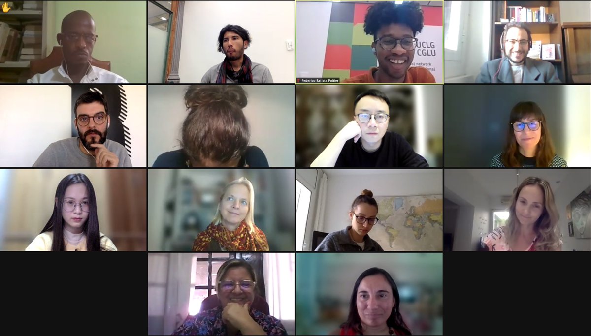 Participants smiling through zoom squares on the last day of the training