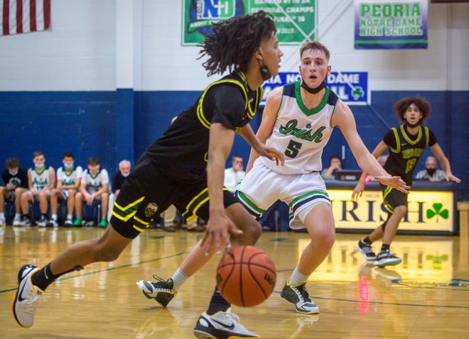 AdamDuvall's tweet photo. “He’s just an old-time tough, glue-guy kind of player"

@davdwilliams drives state-ranked @PND_Basketball 

Story: https://t.co/jyWbBN9byT

#pjspreps https://t.co/c6sZ5UoE2L