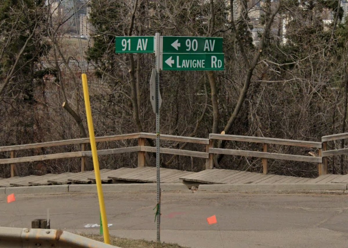 petition for <a href="/AvrilLavigne/">Avril Lavigne</a> to take a selfie in front of the Lavigne Road sign in May