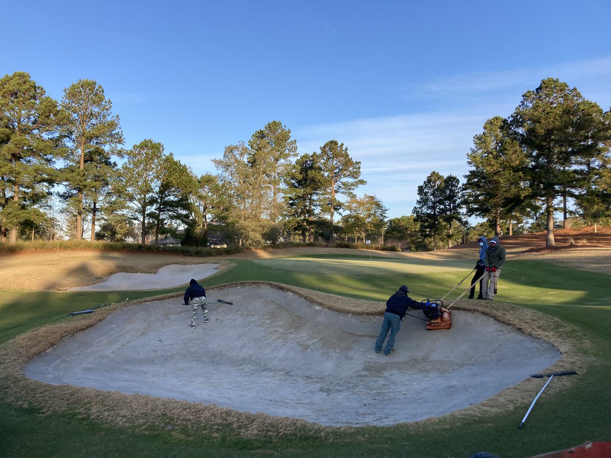 Getting these bunkers perfected this off season. Faces getting tamped after adding/moving sand to  keep uniform conditions throughout traps.