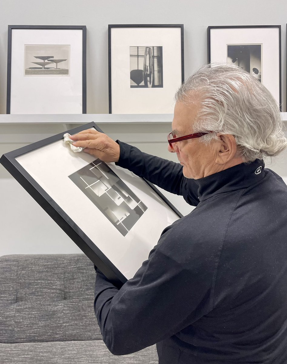 PDNBGallery's tweet photo. Burt is making sure that the #photographs for our upcoming #exhibition are ready for display. It’s not quite installation week but it is time to be meticulous with the details.

Please join us Sat., Feb. 19, 5-8 pm for the opening reception of THE BAUHAUS IN TEXAS.

#pdnbgallery https://t.co/VBm2pfITou