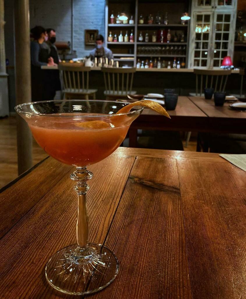 PuritanCo's tweet photo. Let’s talk about this snow thing. We’ll be open at 5 with cocktails (like this beauty from @daikonicon), a special 3 course snow day menu (and our regular menu. Let’s hang out! Takeout will be available as well! (No delivery.) #openinbos https://t.co/n6065MH4cZ