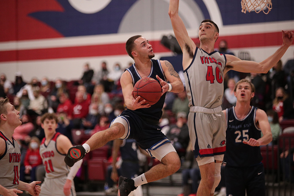 DSU_Athletics's tweet photo. M 🏀:  Trojan men's basketball holds off V-Hawks 70-65 in La Crosse, Wis. - @DakotaStateMBB 

��️ https://t.co/qMNyM0HR1c

DSU's 7th win in the last nine games

#WeAreDSU #GoTrojans #DSUTrojanPride #DSUStrong #TrojanStrong #TrojanFamily #LoyaltoBlue #TrojanNation⚔️ https://t.co/fw2eKsLdfw