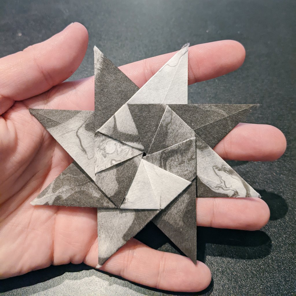 little star folded from marbled paper my boyfriend made https://t.co/WebM3EN7L0