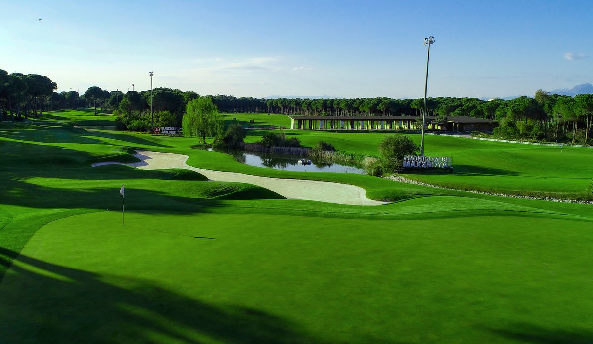 Happy weekend to all! ⛳️The 18th hole and green view with water hazards in front of the #MontgomerieMaxxRoyal clubhouse.⛲️🌲 #MaxxRoyal #Belek #Antalya #Turkey