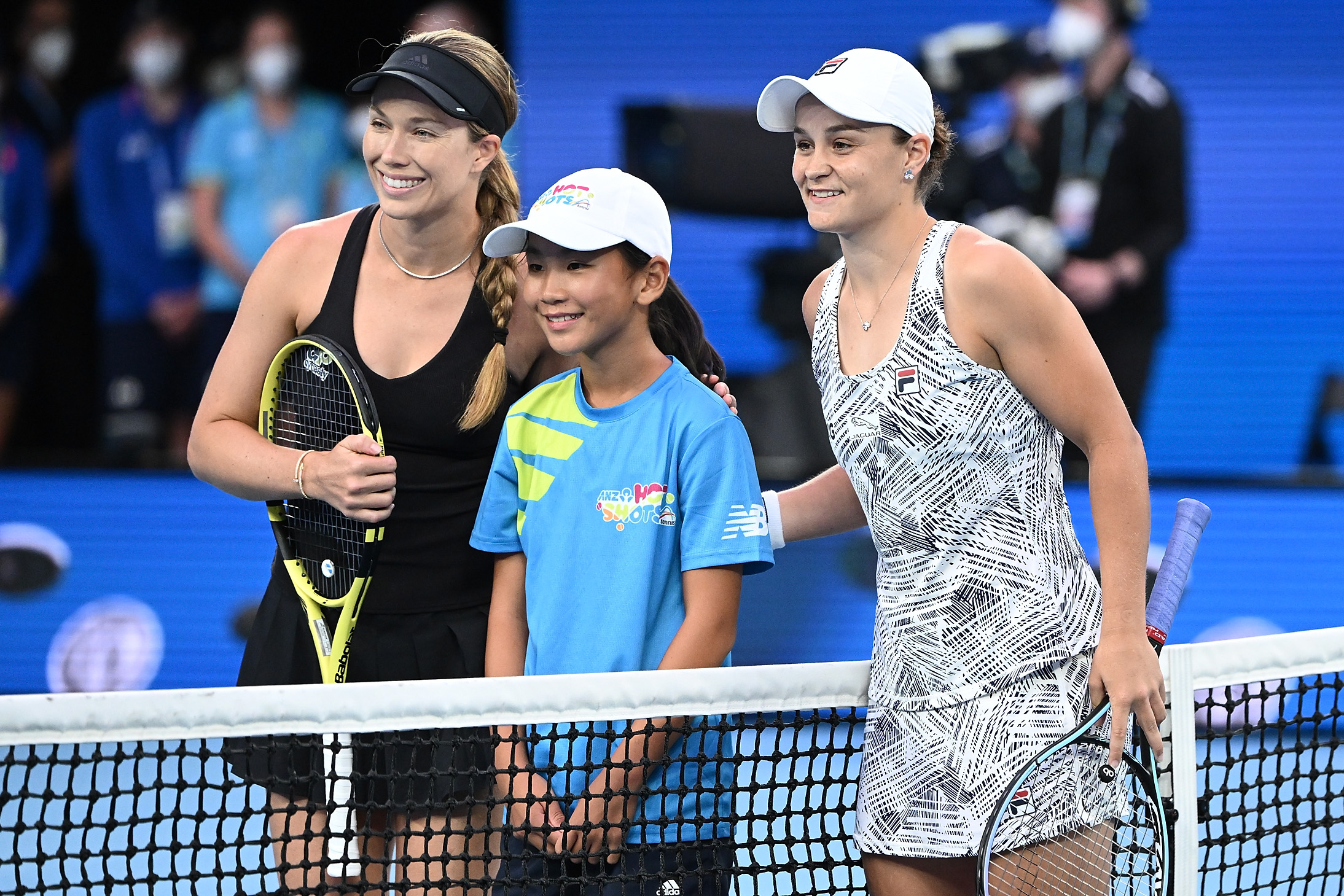 Ash Barty and Danielle Collins pose for a photograph ahead of their women’s singles final match during Day 13 of the 2022 Australian Open at Melbourne Park