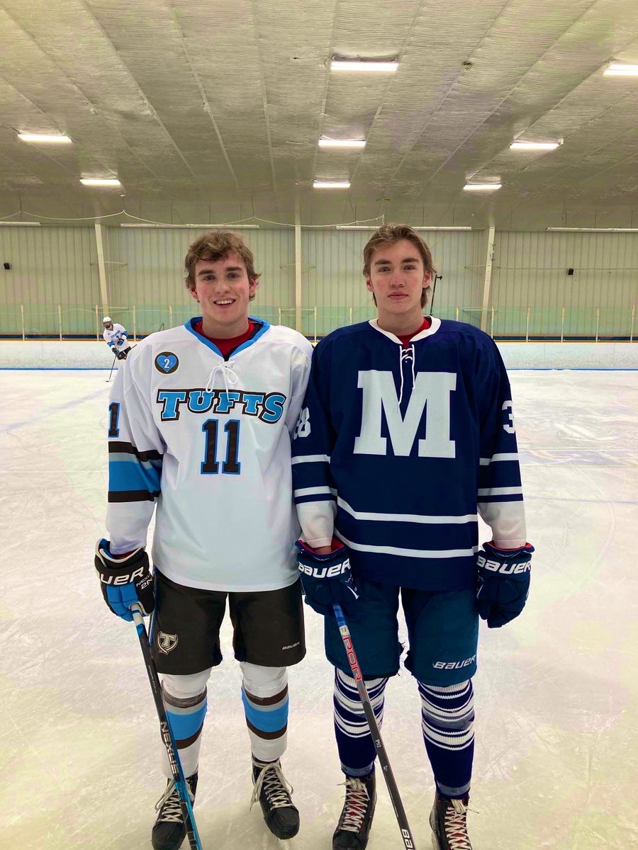 NHShuskyhockey's tweet photo. How awesome is this? Marek and Daniel Pechr Class of ‘21 battled against each other last night as @TuftsMensHockey took on @middmhockey! Big brother takes this one! #HuskyNation https://t.co/s8wQNqBuxL