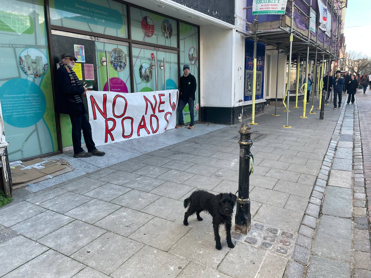 Two men and a dog against road building in a climate crisis.

#roadsrebellion
#nonewroads