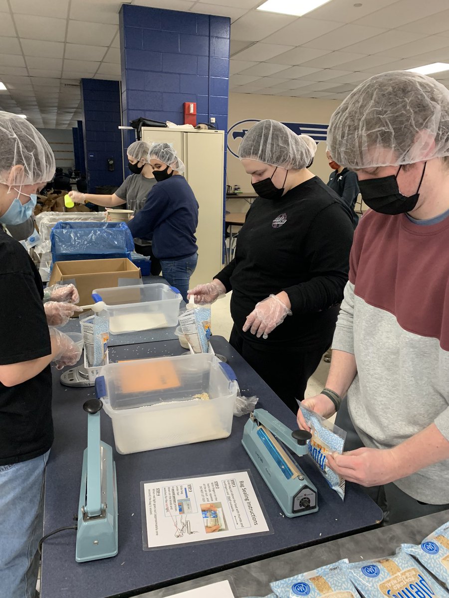 Class council and NHS members working hard to pack meals for Lesotho! End Goal is 25,000 meals!
