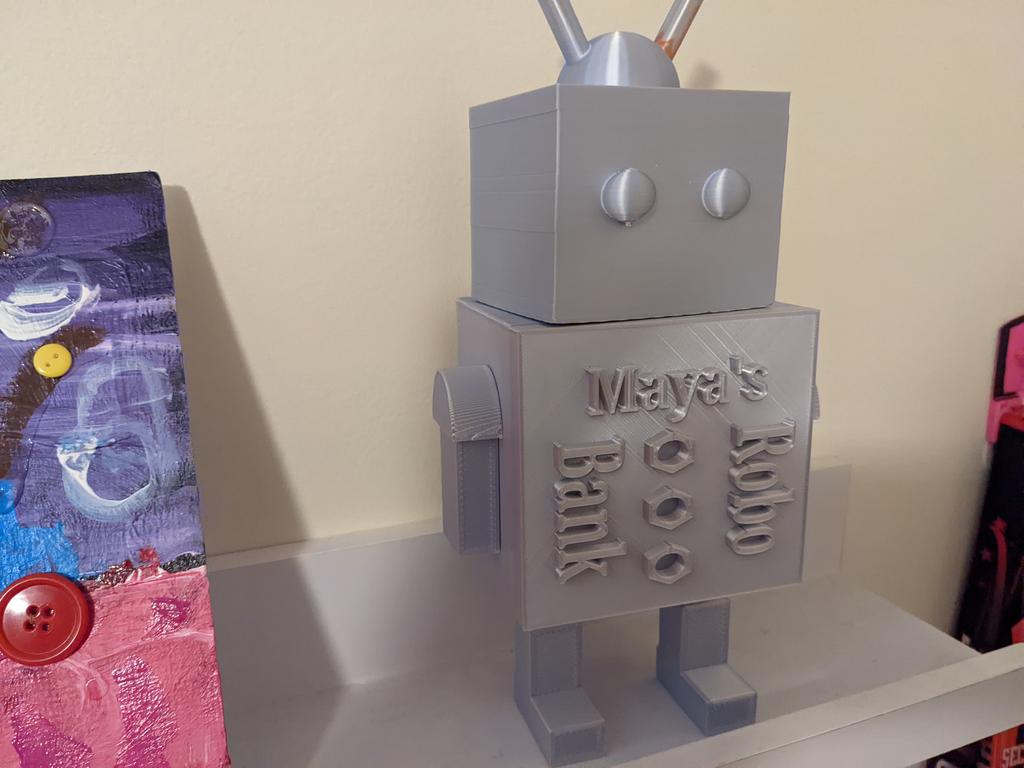 My daughter wanted a bank, so she modeled one on <a href="/tinkercad/">Tinkercad</a> and we 3D printed it.