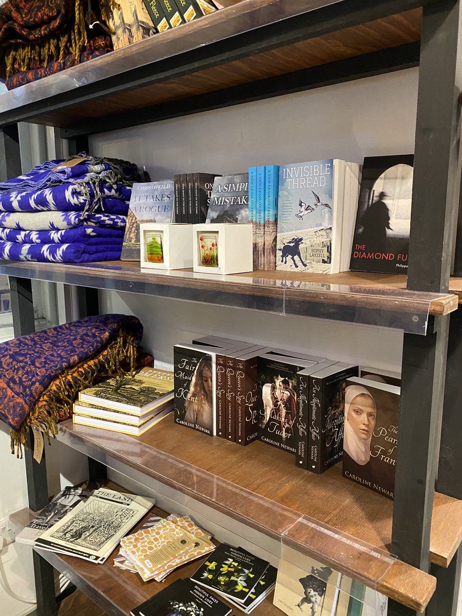 Maddsophy's tweet image. A lovely selection of books by local authors at the Trading Post, Lopen, Somerset including mine 💕 #invisiblethread @Trading_Post_TP