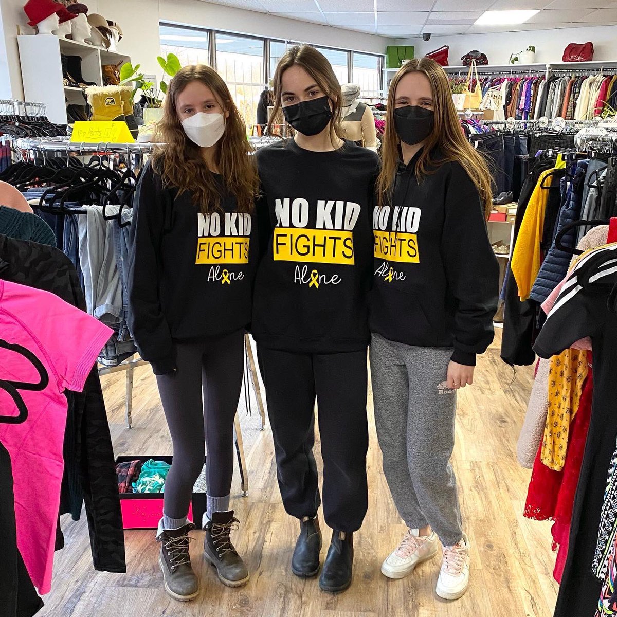 My girls & friend. Collected hundreds of articles of clothes & selling tomorrow with the help of local shop. For a girl in our area with cancer. Have never felt so proud. #clothesforacause