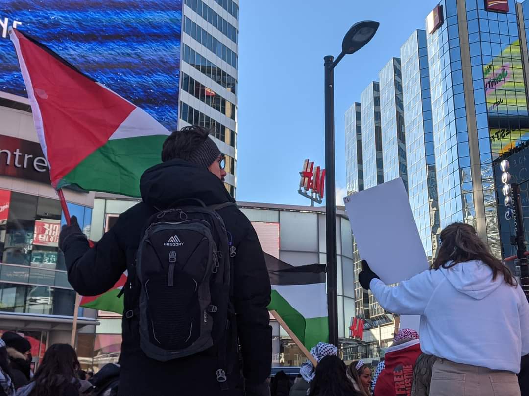 Hundreds of protesters take part in the #HandsOffPalestine rally in downtown Toronto against the ongoing displacement and violence happening against Palestinians in Sheikh Jarrah, Hebron, and Al-Naqab, today.