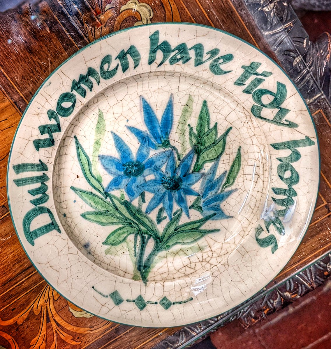 Warblefly's tweet photo. Spotted last night after dinner in a house in the next village. I wouldn't necessarily agree with the slogan — however, as my mother heard very often from me: "But 𝙄 know where everything is." #ceramics #craquelure #crackle https://t.co/3mHv5xy834