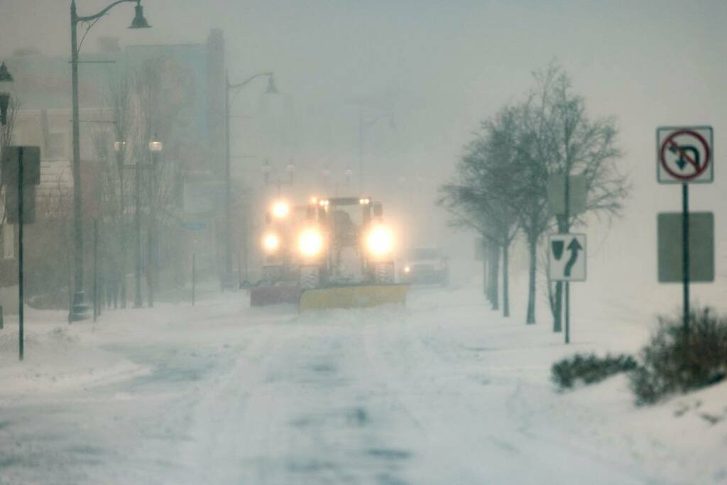 Scenes from yesterday's Blizzard in Boston.
..
..
Snowplows clear snow from Broadway in Sullivan Square during the height of the storm.
..
A crew of workmen move snow from the front entrance of Tatte on Washington St.
..
Members of the Northeastern swim … instagr.am/p/CZWs-P2uXw2/