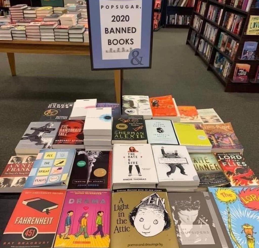 brebabinec's tweet photo. This makes me want to buy the remaining books I don’t have on this table, and have all of my students read them. Banning books is stupid! If you don’t want to read something, don’t. It’s that simple. https://t.co/yQdkJODGJu