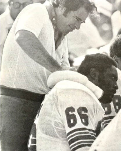 RaoJay2's tweet photo. Miami Dolphins offensive lineman Larry Little gets a neck rub on the sidelines from trainer Bob Lundy. Lundy spent 27 seasons with the Dolphins organization from 1966 to 1992. #BobLundy #MiamiDolphins #OrangeBowl #LarryLittle https://t.co/V04mrtbSl3