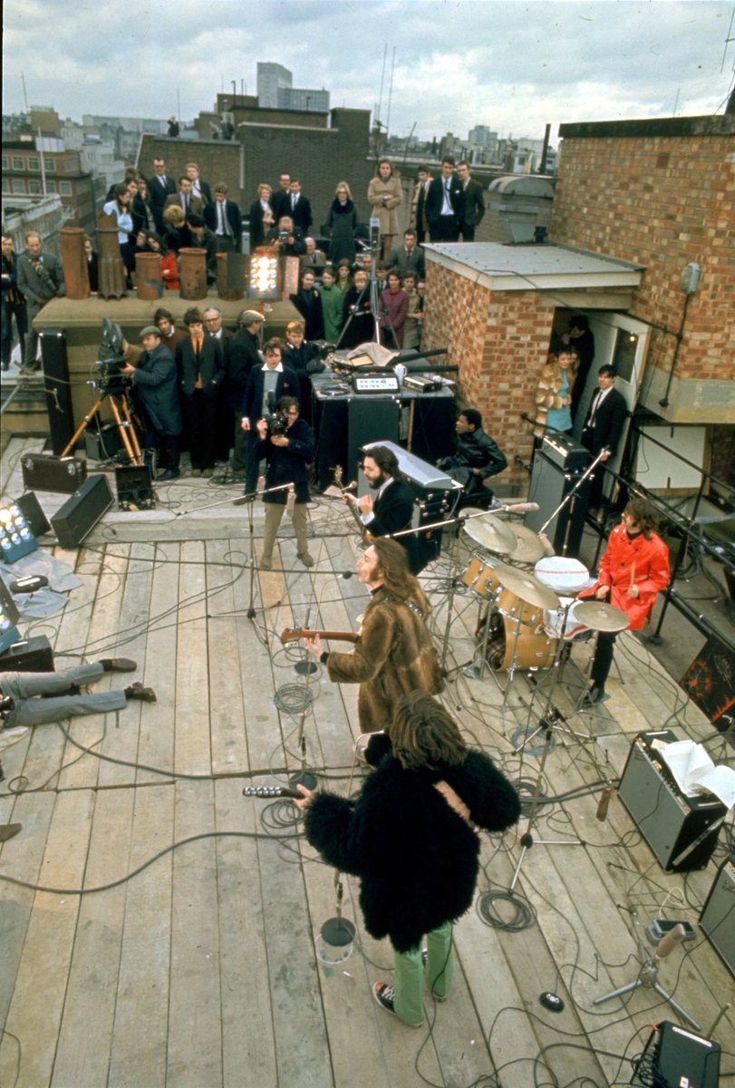 BeatlesEarth's tweet photo. Today in 1969, The Beatles performed their legendary rooftop concert on the top of the Apple Corps building in London. 

They played for the city for 42 minutes before being stopped by the police. 

It was John, Paul, George, and Ringo’s final public performance as “The Beatles”. https://t.co/oZAkkvYytH