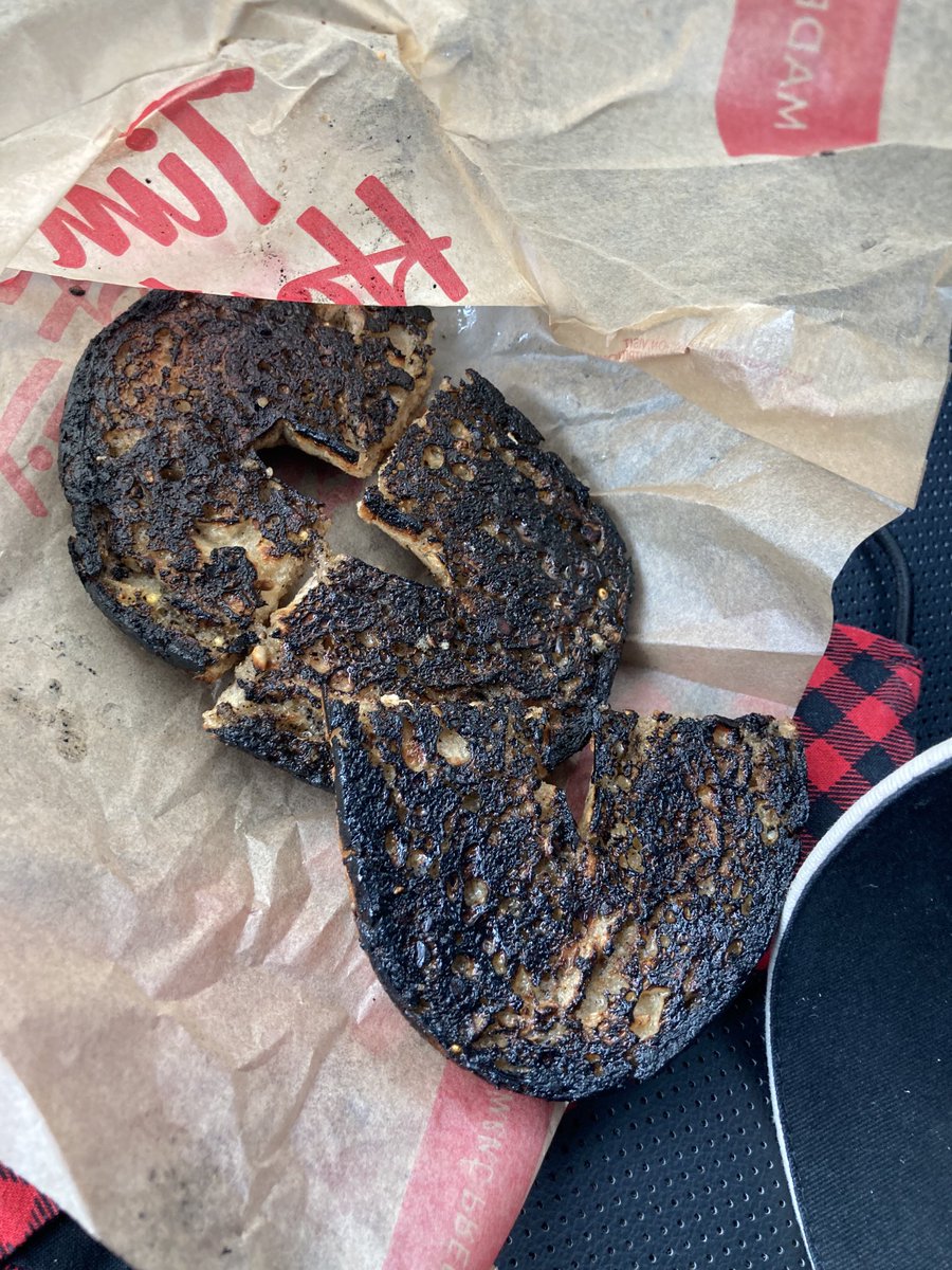 I ordered a small DD and a old fashioned donut.  I don’t mind little mistakes.  I am not perfect.  But putting out a burnt bagel???  Or is this a new Tims B product.  ⁦<a href="/Tim/">Tim Bradshaw</a> Hortons⁩