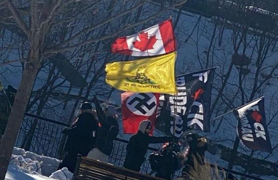 CanadianFSWC's tweet photo. We are disturbed by the appearance of Holocaust symbols at the rally in Ottawa yesterday protesting government responses to the COVID-19 pandemic. These symbols of hate and genocide have no place in Ottawa or anywhere in Canada. 

Read our statement here: https://t.co/Zi23Z32m6K https://t.co/eZOvuDuFvt