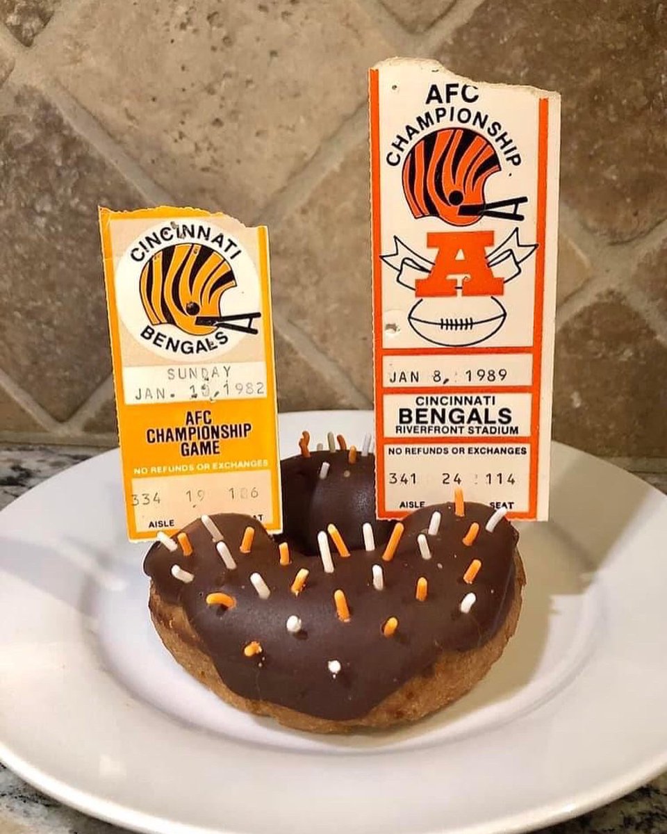 AJHeinrich's tweet photo. Congrats to the #Bengals and my husband, Steve, who singlehandedly propelled them to the #SuperBowl by making a victory donut before each playoff game. The hand-selected, lovingly placed sprinkles + his actual AFC Championship ticket stubs from 1982 and 1989 = magic! #WhoDey https://t.co/BnL1SjNFzM