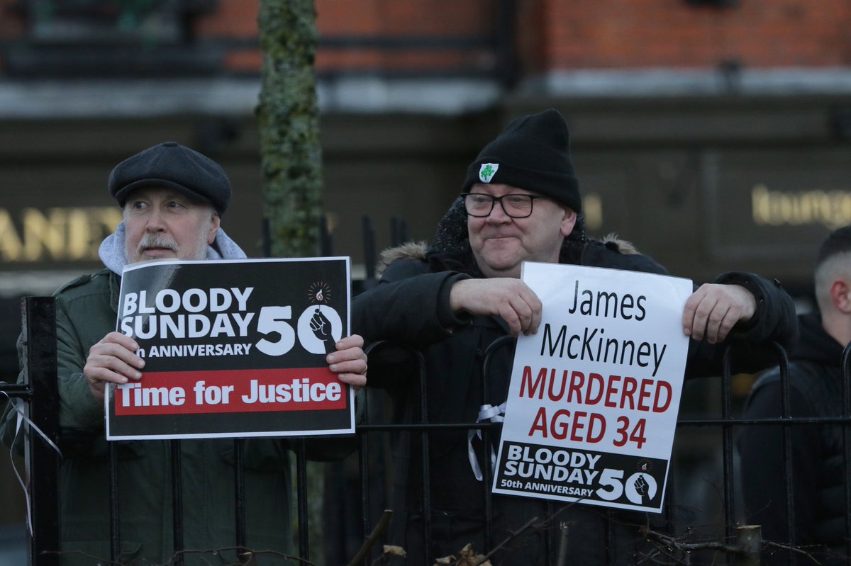 ATownNews's tweet photo. A vigil took place today at Groves-O’Reilly Corner - old barracks site - to mark 50th anniversary of Bloody Sunday. Addressing gathering, Mark Thompson of @RelsForJustice said British attempts to introduce an amnesty for its troops &amp; agents guilty of murder would not succeed. https://t.co/G1wXQrIYAJ
