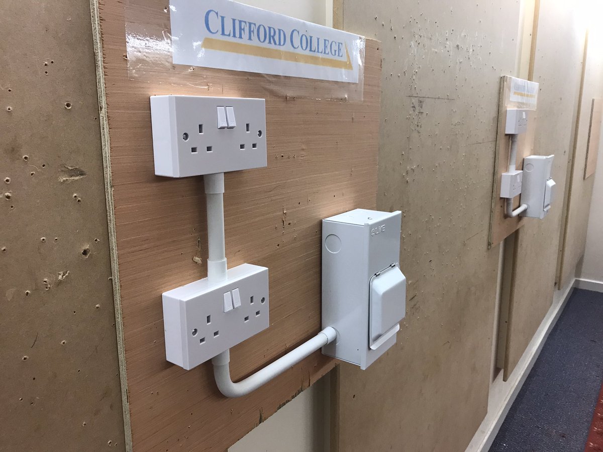 CliffordColleg1's tweet photo. It’s #nationalapprenticeshipweek to celebrate Clifford College are holding a little competition to see which apprentices are the quickest at wiring and second fixing sockets. We don’t condone rushing electrical work but we thought it would be fun to have some rivalry.#NAW2022 https://t.co/ldShpLco6u