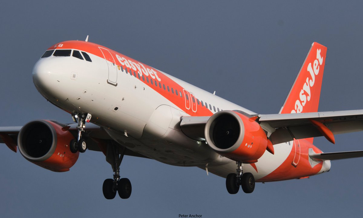Peter34080554's tweet photo. Todays post features the stunning #mightyorange from @easyJet @AirbusintheUK A320 fleet seen here arriving into @manairport on Runway 23R eluminated with the some light and contrast of sky #easyJet #Airbus #A320 #Manchesterairport @avgeek__ https://t.co/pHKgg5eGyD