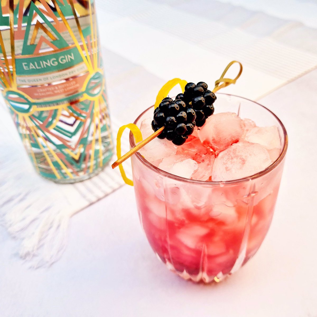 Hello lovely gin drinkers. That’s January done – whether dry or not, congratulations to all! To celebrate why not make yourself this little gem of a cocktail, the Bramble:
50ml Ealing Gin
25ml lemon juice
1 tbsp sugar syrup
1 tbsp crème de mûre 
Blackberries and lemon zest