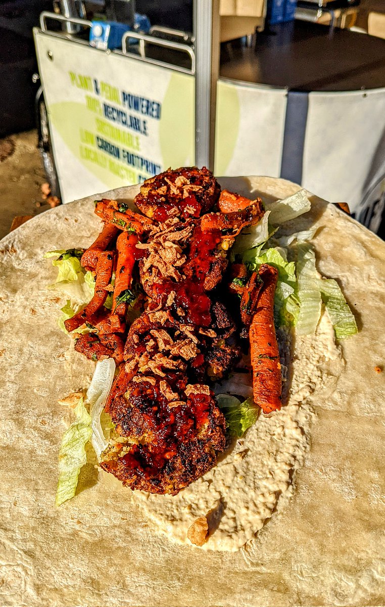 This week's wrap is Fully Loaded Falafel :-
4 Falafels, hummus, harrisa roasted carrots with parsley, homemade Chilli Jam, shredded iceberg lettuce, a sprinkle of crispy fried onions. We added sriracha sauce after the photo and you can too if you like it a little spicier 🌶️