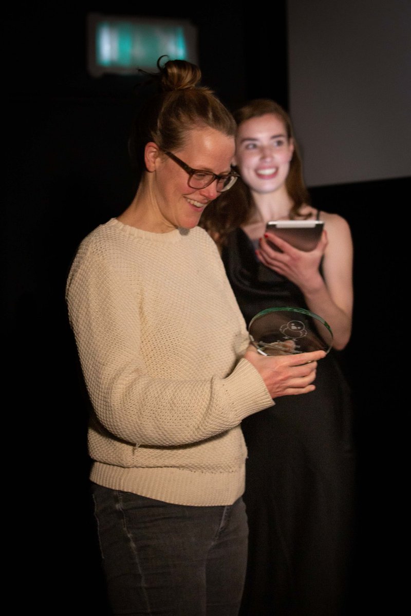 FromStrangeLand's tweet image. Here's our writer/director @csteinbeis accepting the award for BEST F-RATED SHORT FILM at TweetFest in November 2021! uktweetfest.com/2021/12/02/our… #comedy #shortfilm #FRated #awardwinner #thankyou #filmfestival #filmfestivallife #screenwriter #director